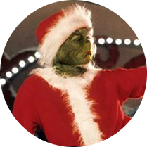 The Grinch In a santa costume looking to the right