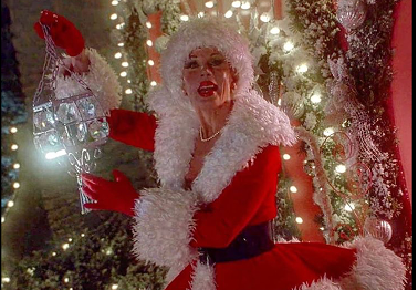 Image of Martha May Who setting up Christmas lights on her house